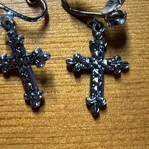 vintage-style sterling silver cross clip-on earrings, often featuring marcasite